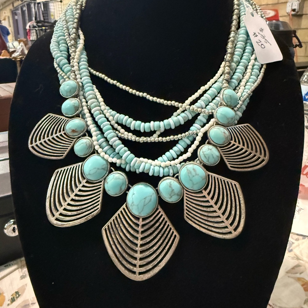 Silver and Blue Layered Necklace with Intricate Pendants